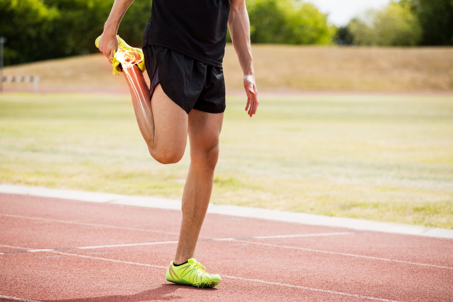 highlighted bones of athlete man stretching on race track