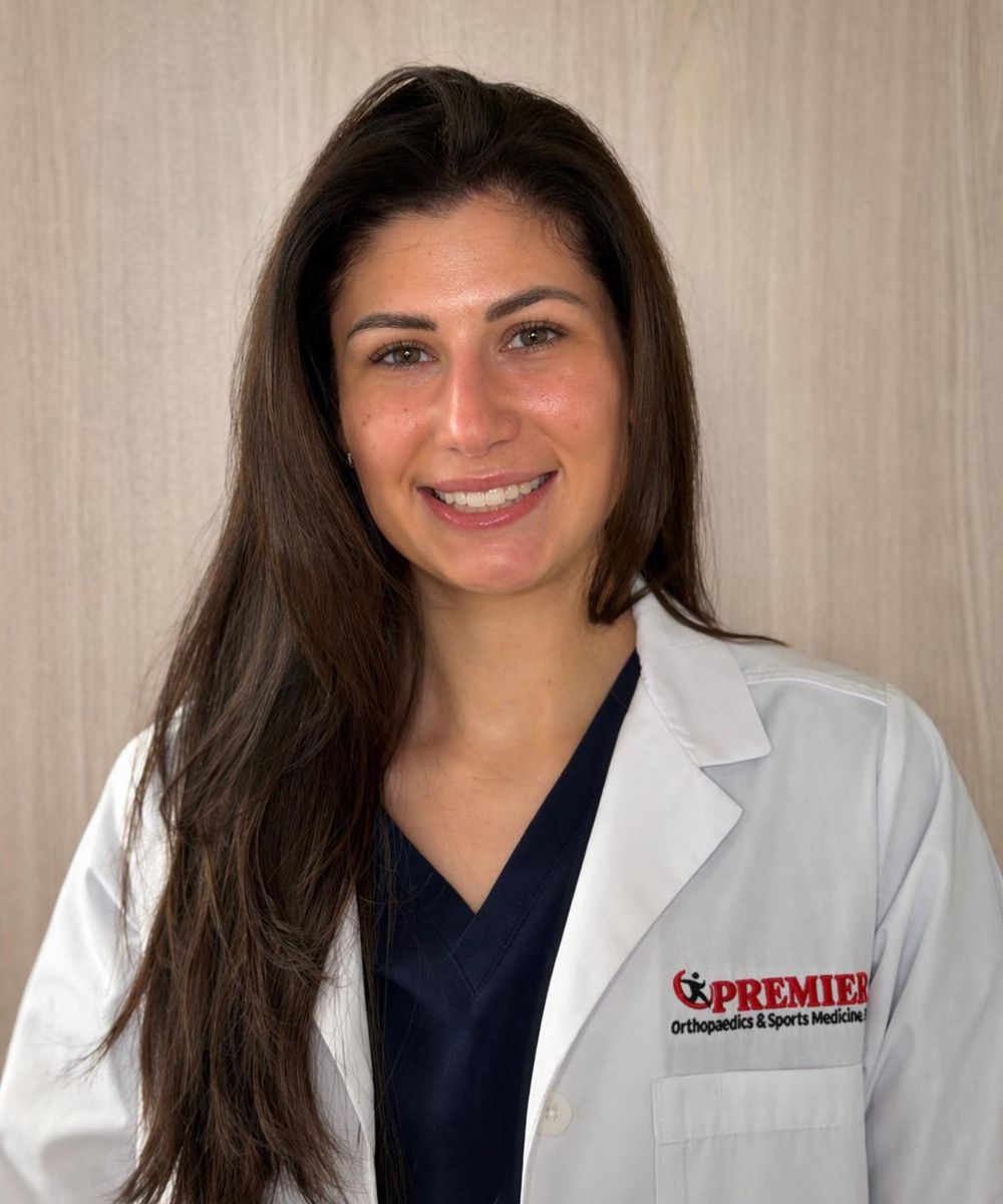 Caroline, clinical care provider helping patients at Premier Spine & Orthopaedics in New Jersey.